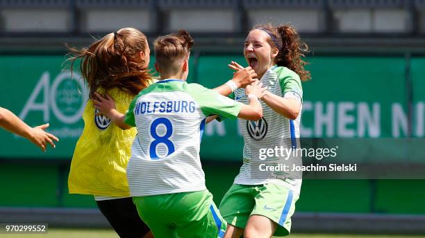 Vanessa Schaefer and Lotta Cordes of Wolfsburg celebrate after the Germany U17 Girl's Championship Final match between VfL Wolfsburg and 1.FC Koeln...