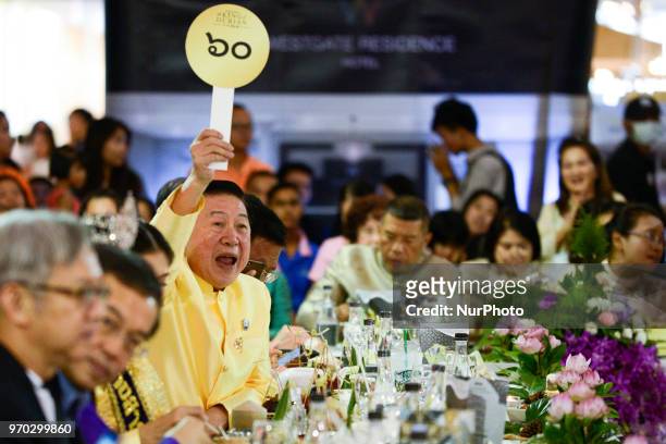 Auctions held at the Durian Fair at department store in Nonthaburi province, Thailand, 09 June 2018. The world's nine most expensive durian were...