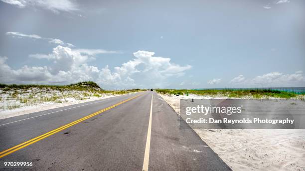 beach road near pensacola, florida - pensacola beach fotografías e imágenes de stock