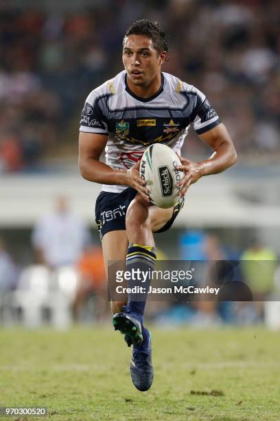 Te Maire Martin of the Cowboys runs with the ball during the round 14 NRL match between the Parramatta Eels and the North Queensland Cowboys at TIO...