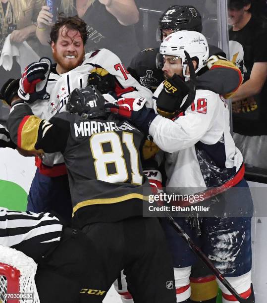 John Carlson and Chandler Stephenson of the Washington Capitals fight Jonathan Marchessault and Shea Theodore of the Vegas Golden Knights after a...