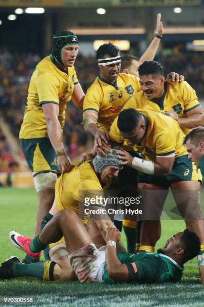 David Pocock of the Wallabies celebrates a try during the International Test match between the Australian Wallabies and Ireland at Suncorp Stadium on...