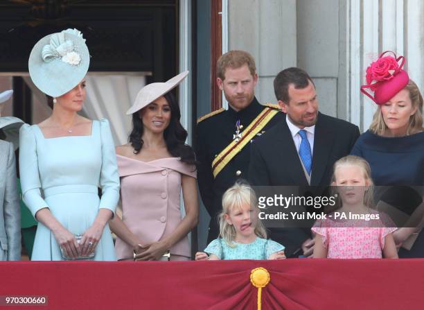 Duchess of Cambridge, the Duke and Duchess of Sussex, Peter Phillips and wife Autumn with their children Savannah and Isla, on the balcony of...