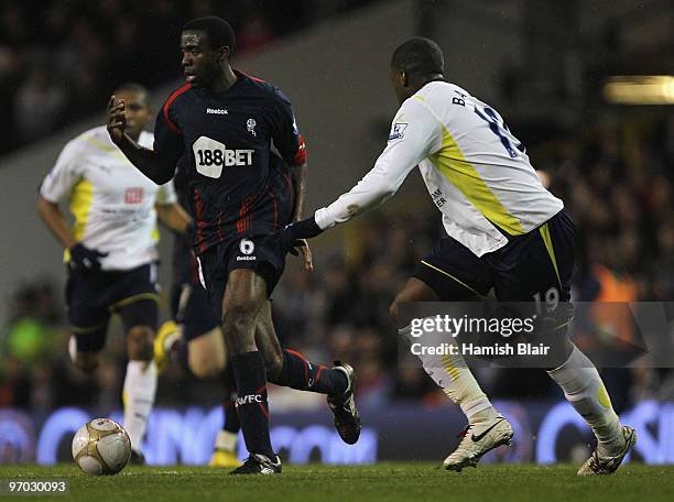 Fabrice Muamba of Bolton in action against Sebastien Bassong of Tottenham during the FA Cup sponsored by E.ON 5th round replay match between...