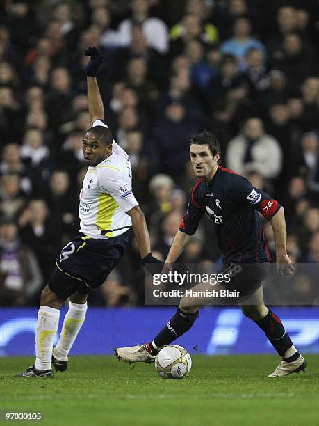 Sam Ricketts of Bolton in action against Wilson Palacios of Tottenham during the FA Cup sponsored by E.ON 5th round replay match between Tottenham...