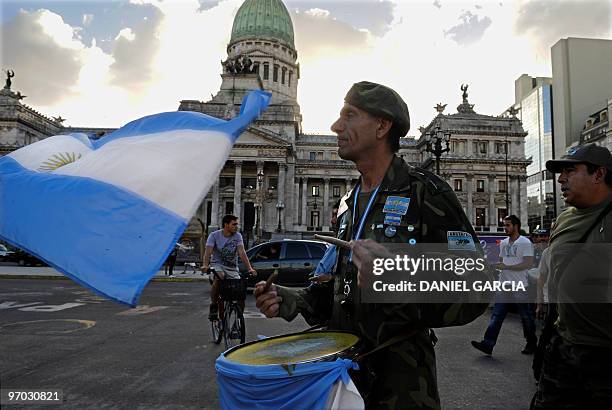 Argentine war veterans of the 1982 South Atlantic war between Argentina and the United Kingdom over the Falkland Islands, stand a demonstration...