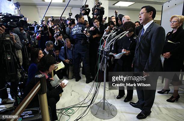 Toyota Motor Corporation President and CEO Akio Toyoda speaks to reporters after testifying before the House Oversight and Government Reform...