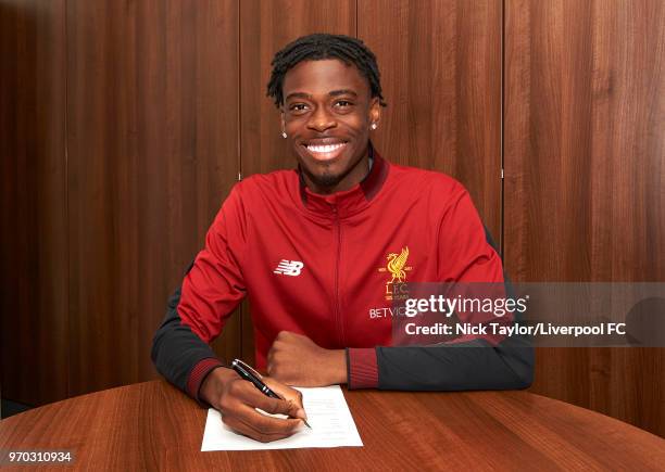 Ovie Ejaria signs a contract extension with Liverpool Football Club on June 4, 2018 in Liverpool, England.