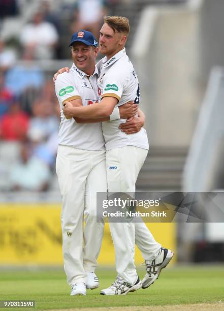 Jamie Porter of Essex celebrates with Neil Wagner after getting Keaton Jennings of Lancashire out during the Specsavers Championship Division One...