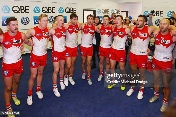 Swans sing the club song after winning during the round 12 AFL match between the St Kilda Saints and the Sydney Swans at Etihad Stadium on June 9,...