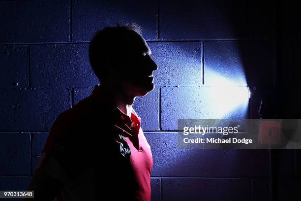 Swans head coach John Longmire walks out during the round 12 AFL match between the St Kilda Saints and the Sydney Swans at Etihad Stadium on June 9,...