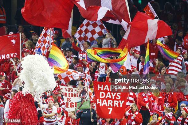 Swans fans celebrate a goal during the round 12 AFL match between the St Kilda Saints and the Sydney Swans at Etihad Stadium on June 9, 2018 in...