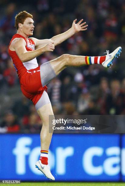 Gary Rohan of the Swans kicks the ball for a goal during the round 12 AFL match between the St Kilda Saints and the Sydney Swans at Etihad Stadium on...
