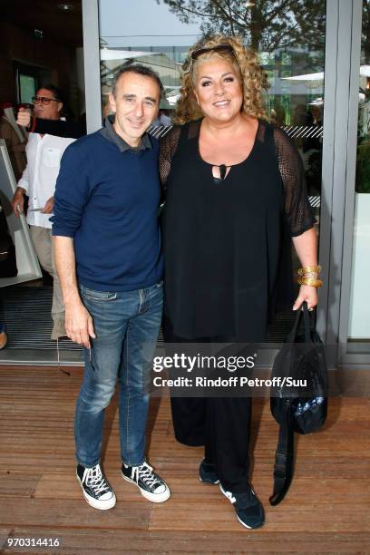 Elie Semoun and Marianne James attend the Women Final of the 2018 French Open - Day Fourteen at Roland Garros on June 9, 2018 in Paris, France.