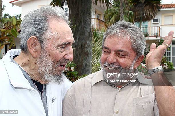 In this handout image provided by the Brazlian Presidency, First Secretary of the Communist Party of Cuba Fidel Castro speaks with Brazil�s President...