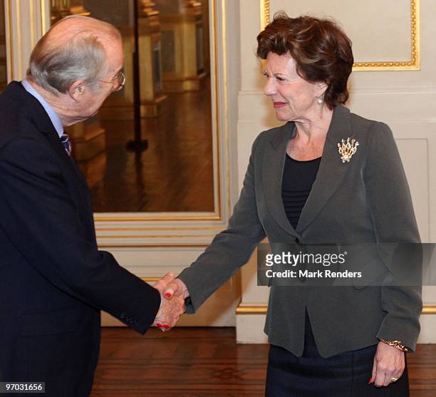 King Albert of Belgium shakes hands with EC Vice President Neelie Kroes during a reception for the European Authorities at the Royal Palace on...