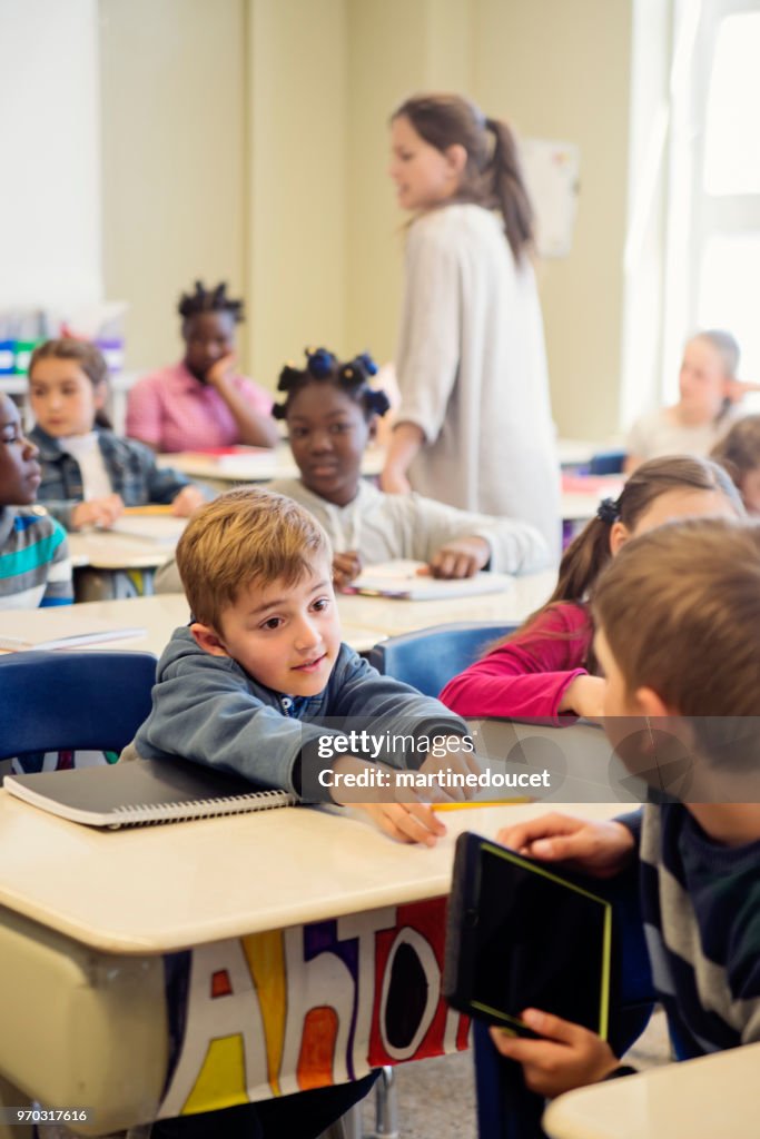 Elementary School Children Misbehaving In Classroom HighRes Stock