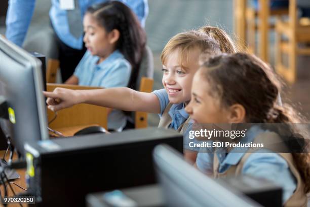 Student Pointing Screen Kid Pointing At Screen Photos and Premium High Res Pictures - Getty Images