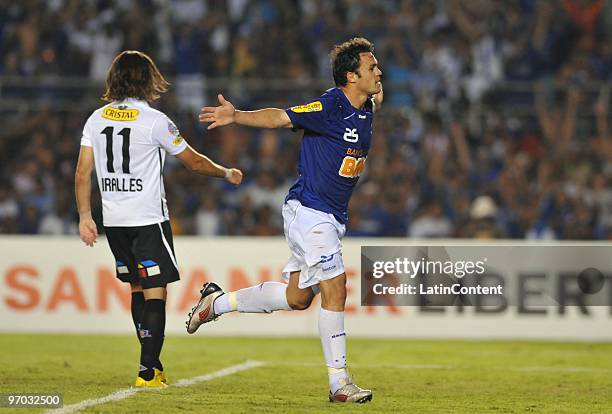 Player Kleber of Cruzeiro celebrates his second scored goal during their soccer match against Colo Colo as part of 2010 Libertadores Cup at Minerao...