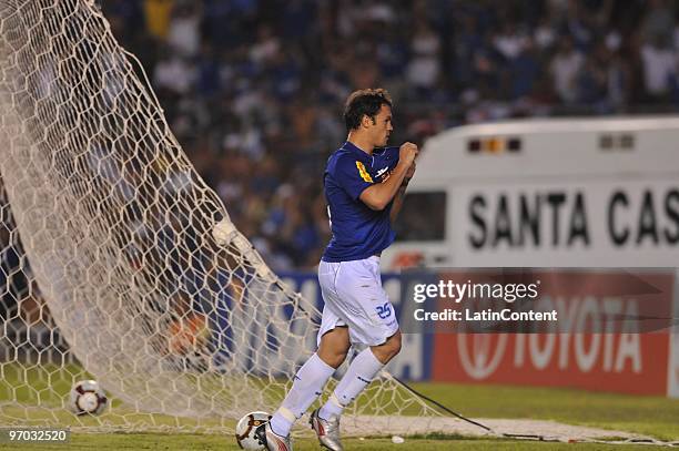 Player Kleber of Cruzeiro celebrates his second scored goal during their soccer match against Colo Colo as part of 2010 Libertadores Cup at Minerao...