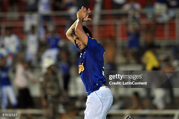 Player Kleber of Cruzeiro celebrates his second scored goal during their soccer match against Colo Colo as part of 2010 Libertadores Cup at Minerao...