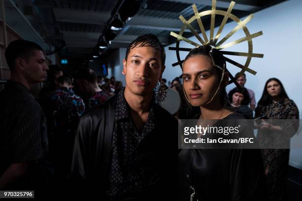 Models backstage at the Edward Crutchley show during London Fashion Week Men's June 2018 at BFC Show Space on June 9, 2018 in London, England.