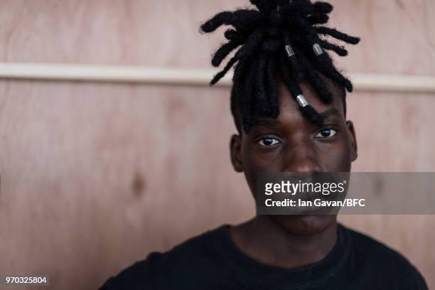 Model backstage at the Edward Crutchley show during London Fashion Week Men's June 2018 at BFC Show Space on June 9, 2018 in London, England.
