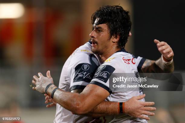 Enari Tuala of the Cowboys celebrates scoring a try during the round 14 NRL match between the Parramatta Eels and the North Queensland Cowboys at TIO...