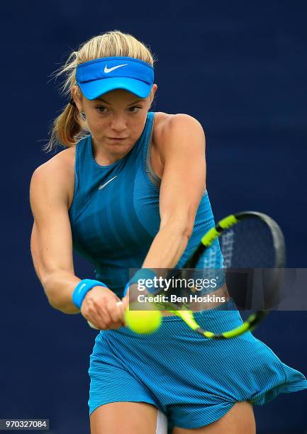 Katie Swan of Great Britain hits a backhand during her qualifying match against Abigail Tere-Apisah of Papua New Guinea on Day One of the Nature...