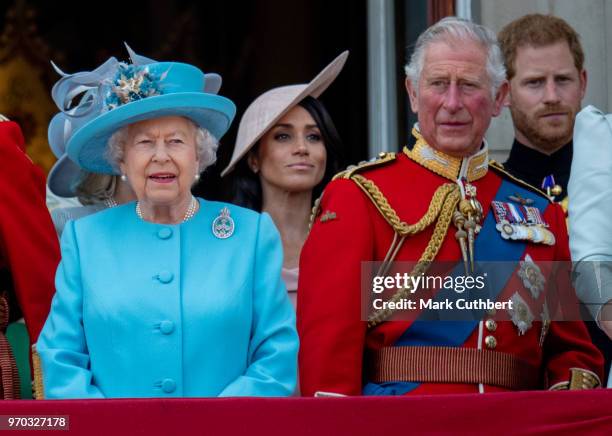 Queen Elizabeth II with Prince Charles, Prince of Wales with Prince Harry, Duke of Sussex and Meghan, Duchess of Sussex during Trooping The Colour...