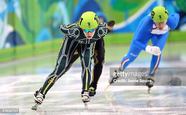 Tatiana Borodulina of Australia and Cecilia Maffei of Italy compete in the Short Track Speed Skating Ladies 1000m heat on day 13 of the 2010...