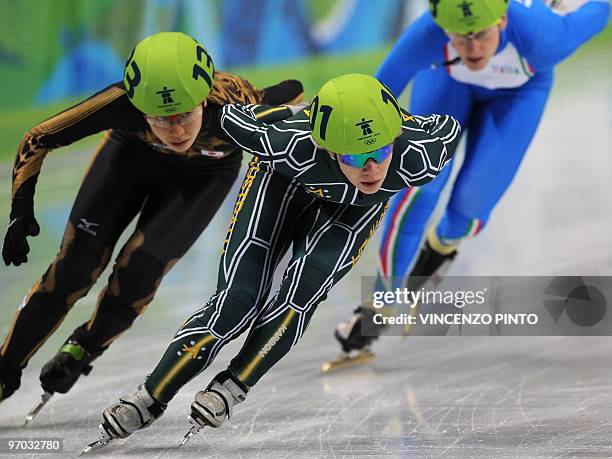 Japan's Mika Ozawa, Australia's Tatiana Borodulina and Italy's Cecilia Maffei compete in the Women's Short Track Speedskating 1000m heats at the...