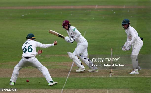 Billy Root of Nottinghamshire looks on as George Bartlett of Somerset scores runs during day one of the Specsavers County Championship Division One...