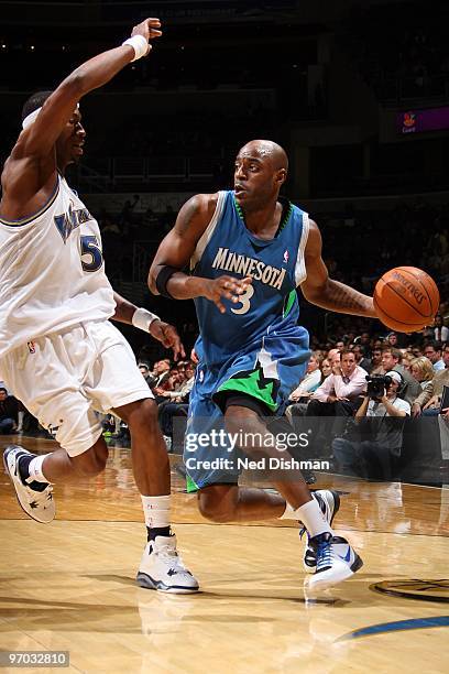 Damien Wilkins of the Minnesota Timberwolves drives against Josh Howard of the Washington Wizards during the game on February 17, 2010 at the Verizon...