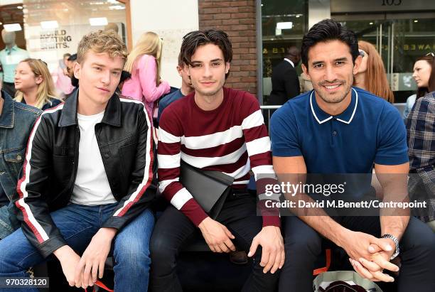 Fletcher Cowan, Jack Brett Anderson and Kirk Newmann sit front row as St James's Hosts LFWM Shows on Jermyn Street on June 9, 2018 in London, England.