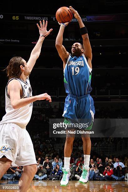 Wayne Ellington of the Minnesota Timberwolves shoots against Fabricio Oberto of the Washington Wizards during the game on February 17, 2010 at the...