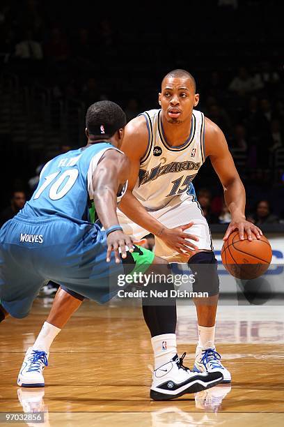 Randy Foye of the Washington Wizards handles the ball against Jonny Flynn of the Minnesota Timberwolves during the game on February 17, 2010 at the...