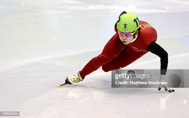 Wang Meng of China competes in the Short Track Speed Skating Ladies 1000m heat on day 13 of the 2010 Vancouver Winter Olympics at Pacific Coliseum on...