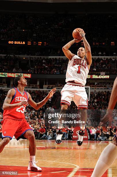 Derrick Rose of the Chicago Bulls shoots a jump shot against Louis Williams of the Philadelphia 76ers during the game at United Center on February...