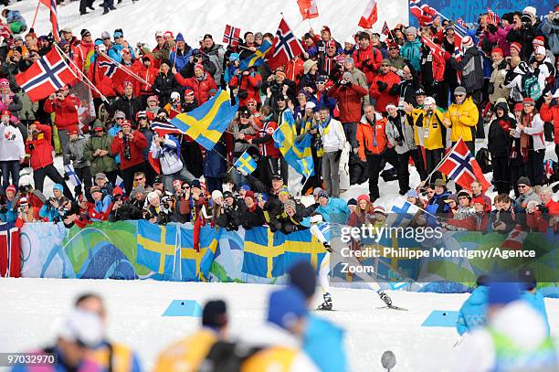 Marcus Hellner of Sweden takes 1st place during the Men's Cross Country Skiing 4x10km Relay on Day 13 of the 2010 Vancouver Winter Olympic Games on...