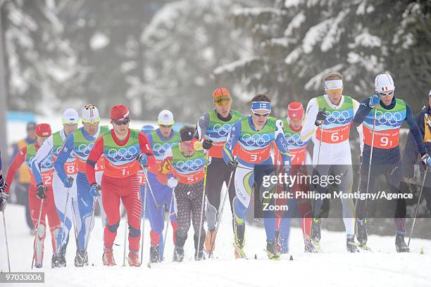 Jean Marc Gaillard of France, Martin Johnsrud Sundby of Norway, Daniel Richardsson of Sweden during the Men's Cross Country Skiing 4x10km Relay on...