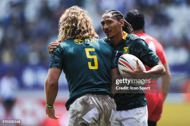 Werner Kok celebrates his try with Justin Geduld of South Africa during match between South Africa and Russia at the HSBC Paris Sevens, stage of the...