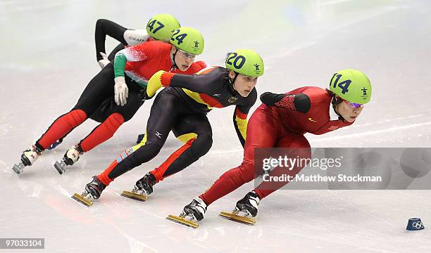 Zhou Yang of China leads Aika Klein of Germany, Erika Huszar of Hungary and Paula Bzura of Poland in the Short Track Speed Skating Ladies 1000m heat...