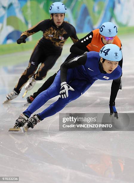 South Korea's Sung Si-Bak Sung , Netherlands' Niels Kerstholt and Japan's Takahiro Fujimoto compete in the Men's 500m Short Track Speedskating heats...