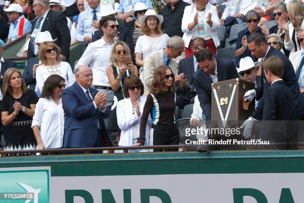 Tennis player Arantxa Sanchez Vicario, Mayor of Paris Anne Hidalgo and President of French Tennis Federation Bernard Giudicelli attend Actress...