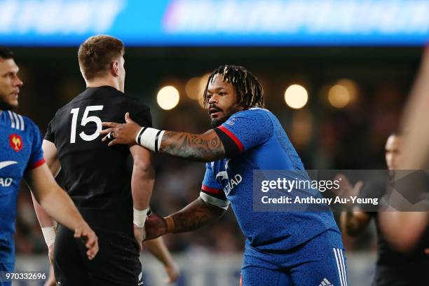 Mathieu Bastereaud of France gives a pat on the back to Jordie Barrett of the All Blacks during the International Test match between the New Zealand...