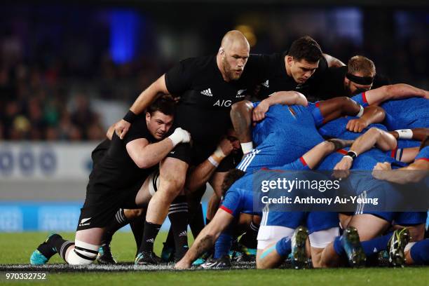 Owen Franks of the All Blacks packs down a scrum during the International Test match between the New Zealand All Blacks and France at Eden Park on...