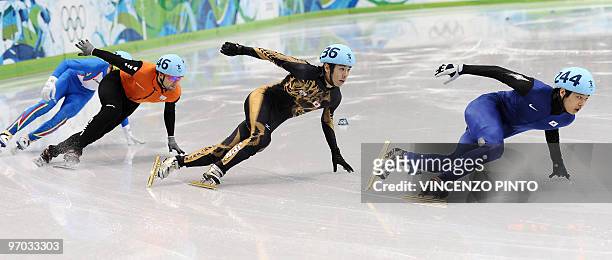 South Korea's Sung Si-Bak, Japan's Takahiro Fujimoto, Netherlands' Niels Kerstholt and Italy's Nicolas Bean compete in the Men's 500m Short Track...