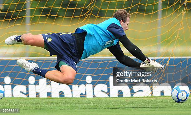 Clint Bolton dives for the ball during an Australian Socceroos training session at Carrara Stadium on February 25, 2010 in Gold Coast, Australia.