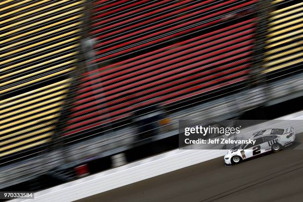 Brad Keselowski, driver of the Miller Lite Ford, practices for the Monster Energy NASCAR Cup Series FireKeepers Casino 400 at Michigan International...